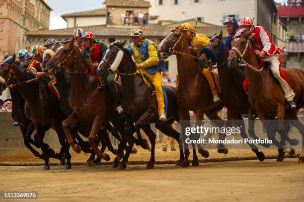 Piazza del Campo - The ten horses fight for first place. Palio, is a horse race that is held twice each year, on 2 July and 16 August, in Siena,...