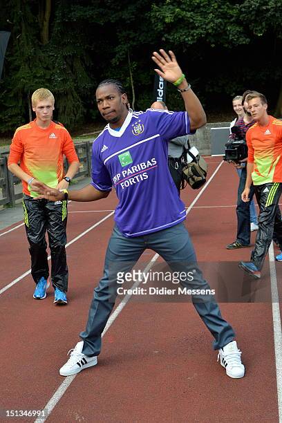 Yohan Blake of Jamaica trains with the kids at the Adidas Kids Clinic at the stadium De Drie Fonteinen as part of the IAAF Golden League Memorial Van...