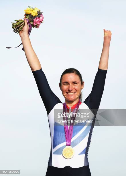 Sarah Storey of Great Britain celebrates winning the Women's C4-5 Individual Road Race on day 8 of the London 2012 Paralympic Games at Brands Hatch...