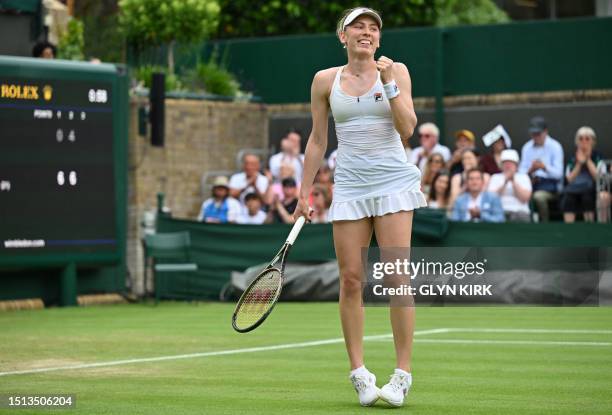 Russia's Ekaterina Alexandrova celebrates beating Hungary's Dalma Galfi during their women's singles tennis match on the sixth day of the 2023...