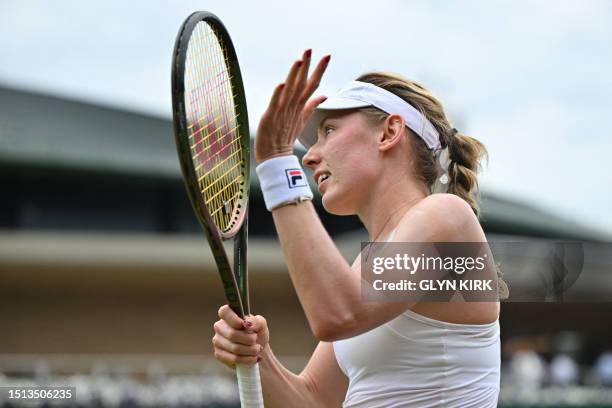 Russia's Ekaterina Alexandrova celebrates beating Hungary's Dalma Galfi during their women's singles tennis match on the sixth day of the 2023...