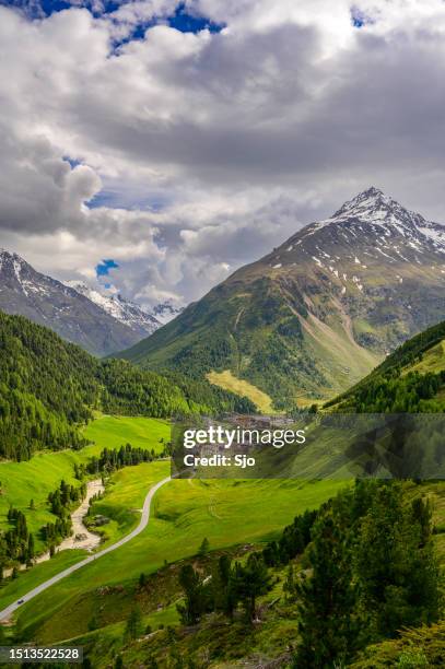 vent village in the tiroler alps in austira during springtime - buttercup stock pictures, royalty-free photos & images