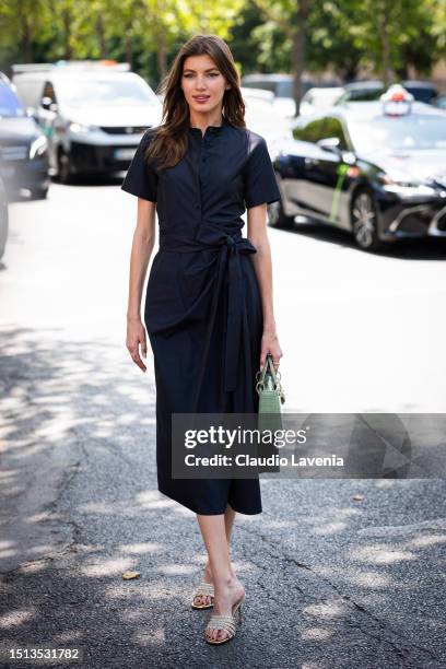 Valery Kaufman wears a blue dress, mint green Lady Dior bag and crystals heels, outside Dior, during the Haute Couture Fall/Winter 2023/2024 as part...