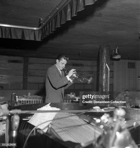Jazz trumpeter Chet Baker performs in a nightclub circa 1952 in New York City, New York.