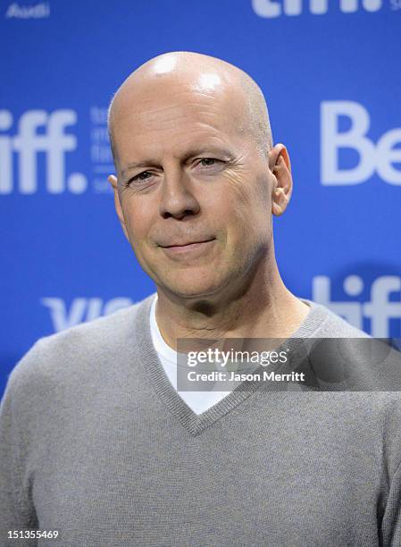 Actor Bruce Willis speaks onstage at the "Looper" press conference during the 2012 Toronto International Film Festival at TIFF Bell Lightbox on...