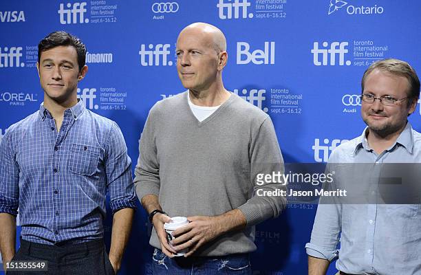 Actors Joseph Gordon-Levitt, Bruce Willis and Director Rian Johnson speak onstage at the "Looper" press conference during the 2012 Toronto...