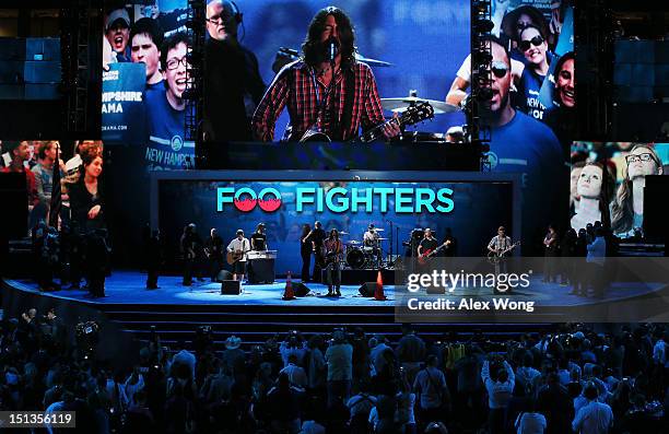 Musican Dave Grohl of the Foo Fighters performs for a soundcheck during the final day of the Democratic National Convention at Time Warner Cable...