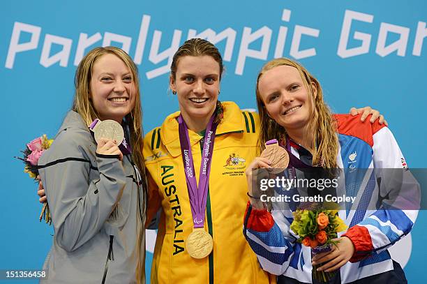 Silver medallist Cortney Jordan of the United States, gold medallist Jacqueline Freney of Australia and bronze medallist Susannah Rogers of Great...