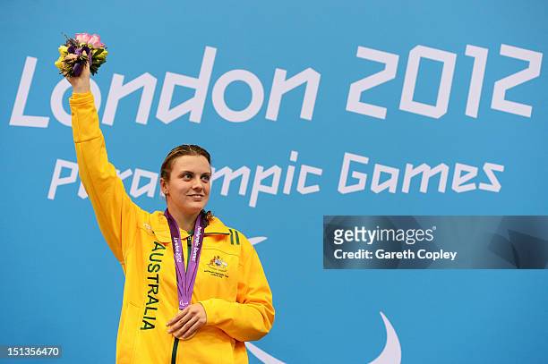 Gold medallist Jacqueline Freney of Australia poses on the podium during the medal ceremony for the Women's 400m Freestyle - S7 final on day 8 of the...