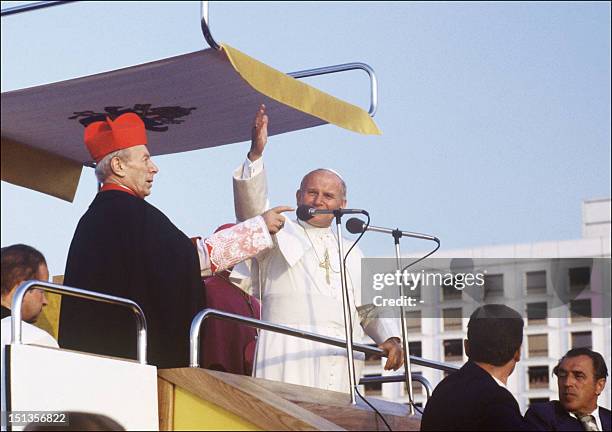 Pope John Paul II and the head of the Catholic church in Poland Cardinal-Archbishop Stefan Wyszynski address faithful 02 June 1979 in Warsaw during...
