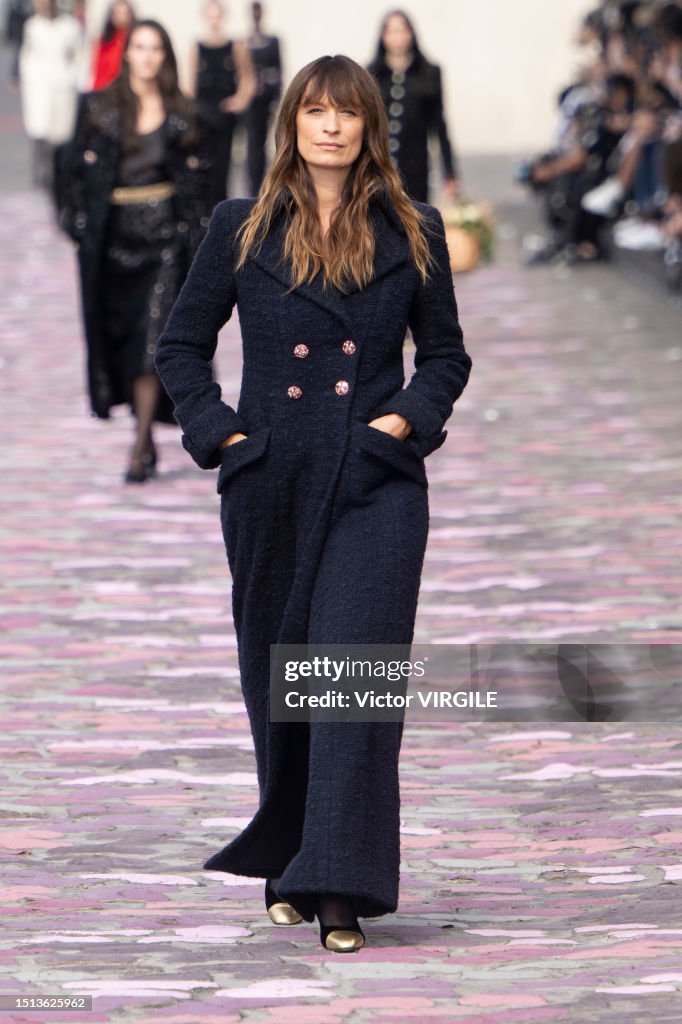 Caroline de Maigret walks the runway during the Chanel Haute