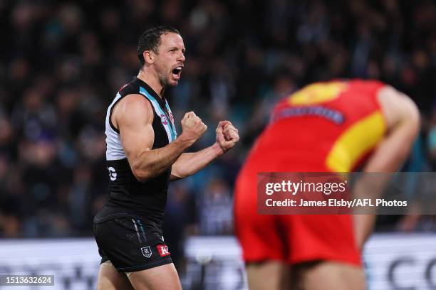 Travis Boak of the Power celebrates a goal during the 2023 AFL Round 17 match between the Port Adelaide Power and the Gold Coast Suns at Adelaide...