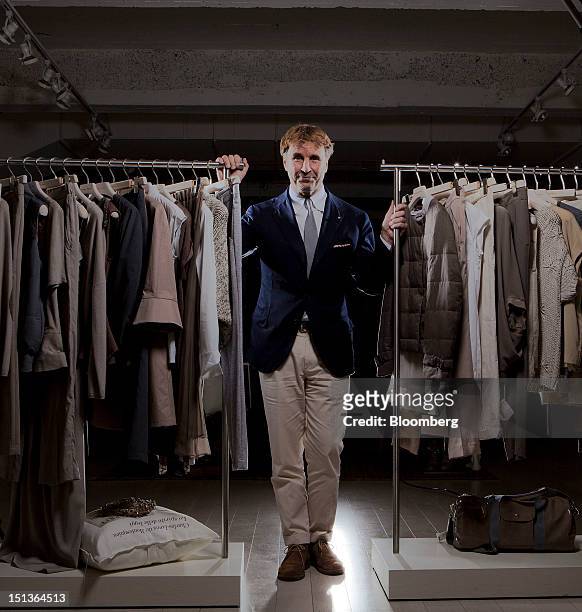 Brunello Cucinelli, chairman and chief executive officer of Brunello Cucinelli SpA, poses for a photograph inside the company's showrooms in New...