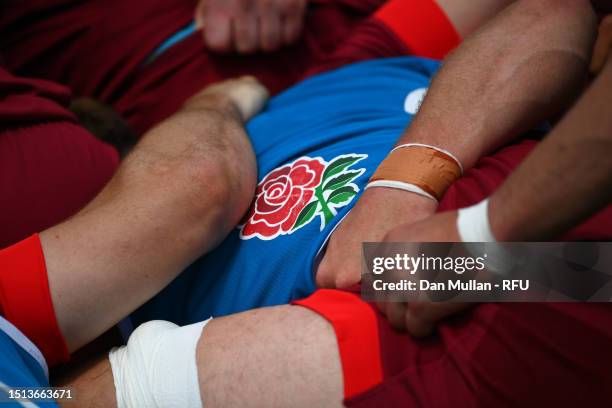 Detailed view of the England rose on a training bib during a training session at The Lensbury on July 03, 2023 in Teddington, England.
