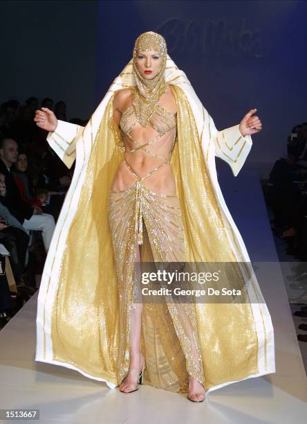 Model wears an outfit from the Bob Mackie Fall Fashion 2001 collection February 16, 2001 on the last day of Mercedes-Benz Fashion Week at Bryant Park...