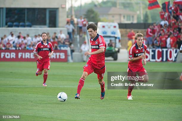 Alvaro Fernandez of Chicago Fire moves the ball up the field against the Houston Dynamo at Toyota Park on September 2, 2012 in Bridgeview, Illinois....