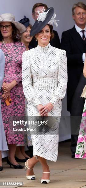 Catherine, Princess of Wales curtseys to King Charles III as she attends The Order of The Garter service at St George's Chapel, Windsor Castle on...