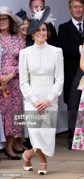 Catherine, Princess of Wales curtseys to King Charles III as she attends The Order of The Garter service at St George's Chapel, Windsor Castle on...