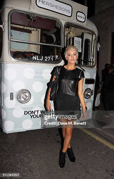 Danni Menzies attends the Hershesons' Pop-Up Blow Dry Bus as part of Vogue Fashion's Night Out on September 6, 2012 in London, England.