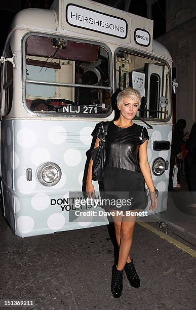 Danni Menzies attends the Hershesons' Pop-Up Blow Dry Bus as part of Vogue Fashion's Night Out on September 6, 2012 in London, England.