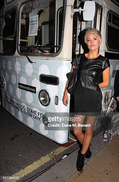 Danni Menzies attends the Hershesons' Pop-Up Blow Dry Bus as part of Vogue Fashion's Night Out on September 6, 2012 in London, England.