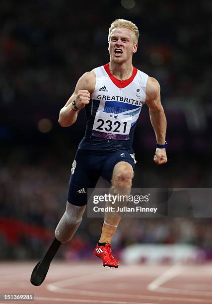 Jonnie Peacock of Great Britain celebrates winning gold in the Men's 100m - T44 Final on day 8 of the London 2012 Paralympic Games at Olympic Stadium...