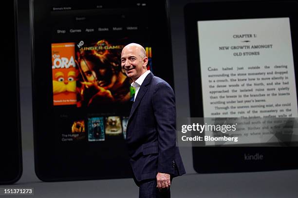 Jeff Bezos, chief executive officer of Amazon.com Inc., leaves the stage after introducing the Kindle Paperwhite and the Kindle Fire HD tablets at a...