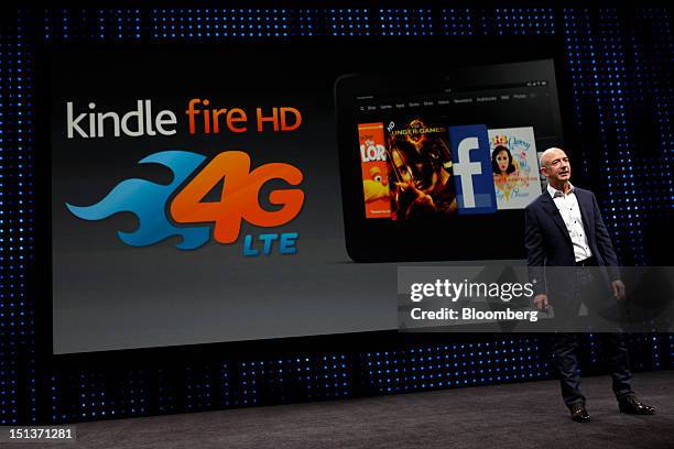 Jeff Bezos, chief executive officer of Amazon.com Inc., introduces the 4G LTE version of the Kindle Fire HD tablet at a news conference in Santa...