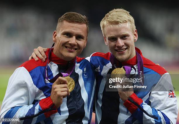 Men's 800m - T54 Gold medalist David Weir of Great Britain and Men's 100m - T44 Gold medalist Jonnie Peacock of Great Britain pose on day 8 of the...