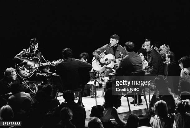 Pictured: Elvis Presley, guitarist Charlie Hodge, guitarist Scotty Moore, Alan Fortas, drummer DJ Fontana during his '68 Comeback Special on NBC --