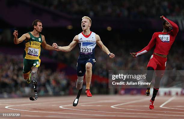 Arnu Bronze medalist Arnu Fourie of South Africa, Gold medalist Jonnie Peacock of Great Britain, silver medalist Richard Browne of the United States...