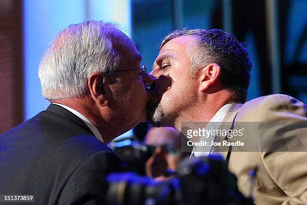 Rep. Barney Frank kisses his spouse Jim Ready during the final day of the Democratic National Convention at Time Warner Cable Arena on September 6,...