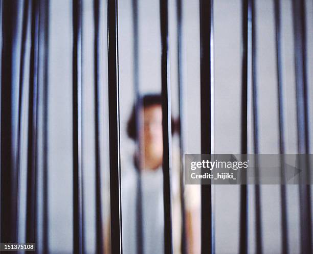 woman in jail - gefängnis stock-fotos und bilder