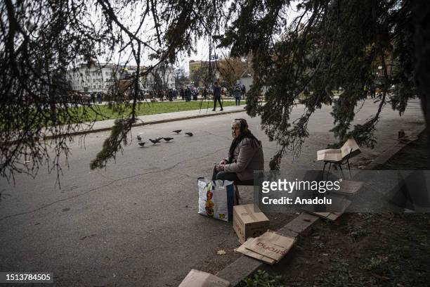 Civilians receive food aid at the city center after the withdrawal of the Russian army from Kherson to the eastern bank of Dnieper River, Ukraine on...