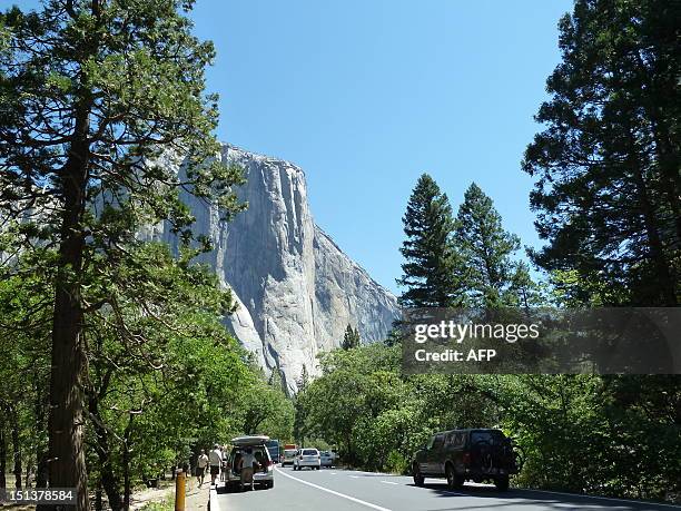 View of soaring rock formations overlooking tourist-filled Yosemite Valley in Yosemite National Park taken on June 25 during the time when Hantavirus...