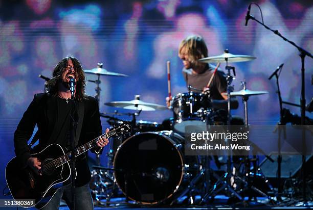 Musican Dave Grohl of the Foo Fighters performs during the final day of the Democratic National Convention at Time Warner Cable Arena on September 6,...