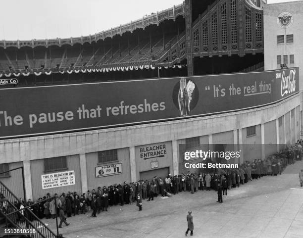 Baseball fans line up outside the Yankee Stadium to see the New York Yankees vs St. Louis Cardinals game for the 1943 World Series Tournament in New...