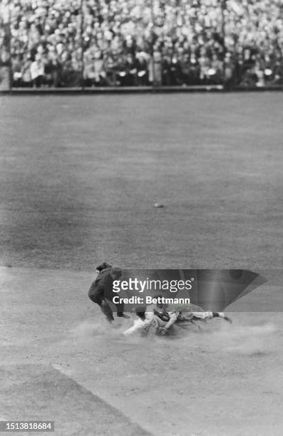 Joyner Clifford "Jo-Jo White" is tagged out at second base by William 'Billy' Jurges during the 1935 World Series tournament, Detroit, Michigan,...