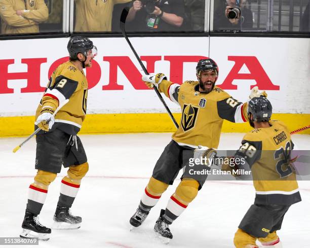 Jack Eichel, Alec Martinez and William Carrier of the Vegas Golden Knights celebrate a goal by Martinez against the Florida Panthers in the second...