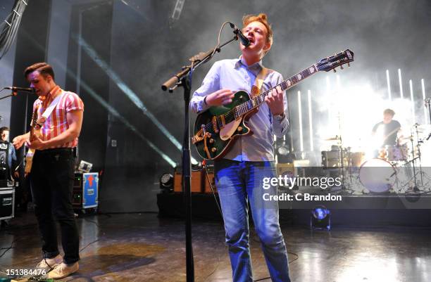 Sam Halliday, Alex Trimble and Benjamin Thompson of Two Door Cinema Club perform on stage at Shepherds Bush Empire on September 6, 2012 in London,...