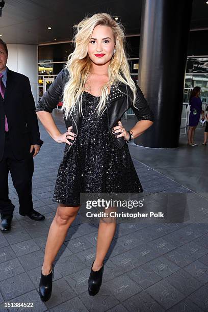 Singer Demi Lovato arrives at the 2012 MTV Video Music Awards at Staples Center on September 6, 2012 in Los Angeles, California.