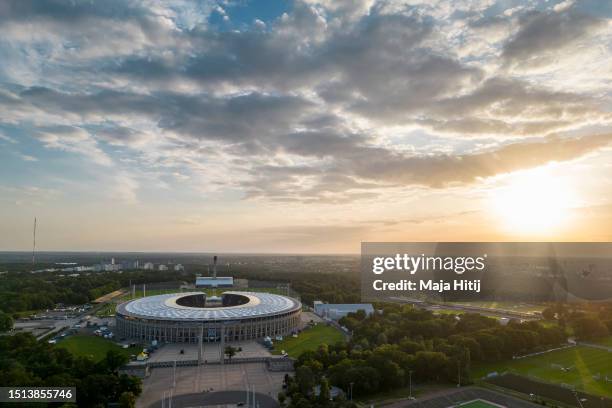 In an aerial view, the Olympic Stadium Berlin stands at sunset on July 02, 2023 in Berlin, Germany.
