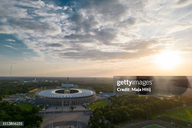 In an aerial view, the Olympic Stadium Berlin stands at sunset on July 02, 2023 in Berlin, Germany.