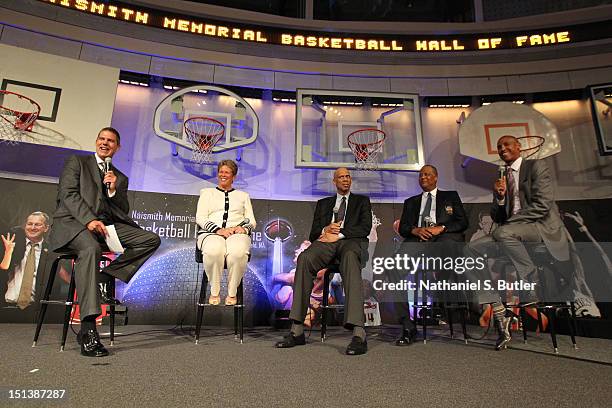 An UCLA roundtable, Moderator Rick Kamla, Anne Meyers, Kareem Abdul-Jabbar, Jamaal Wilkes and Reggie Miller speaks at the Bunn-Gowdy Awards Dinner as...