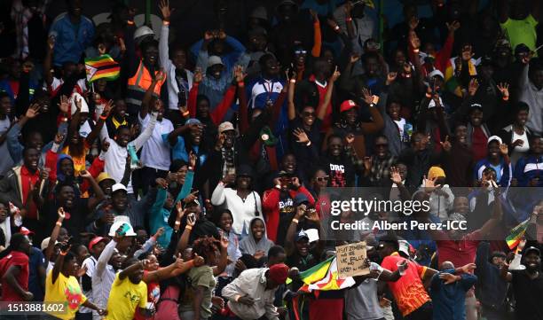 Spectators react in the crowd during the ICC Men's Cricket World Cup Qualifier Zimbabwe 2023 match between Zimbabwe and Scotland at Queen’s Sports...