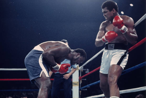 Heavyweight boxers Muhammad Ali and Joe Frazier in action during the second round of their championship fight in Quezon City, Metro Manila,...