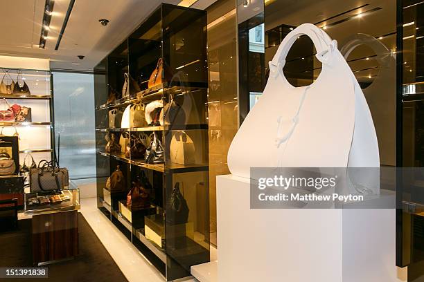 Patrons and fashionistas attend the launch of Gucci Cut & Craft Facebook Campaign during Fashion's Night Out at Gucci Fifth Avenue on September 6,...