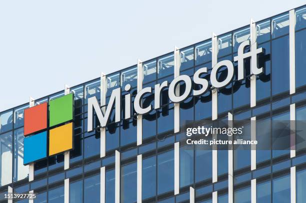 July 2023, Serbia, Belgrad: The logo of the international hardware and software developer Microsoft can be seen on the facade of an office building....