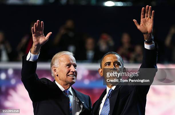 Democratic presidential candidate, U.S. President Barack Obama and Democratic vice presidential candidate, U.S. Vice President Joe Biden wave after...