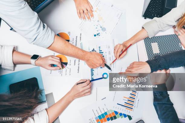 business team working together at office. - market research stock pictures, royalty-free photos & images